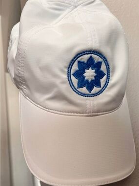 White Topknot Baseball Cap with Blue Embroidered Starburst, Club Pilates